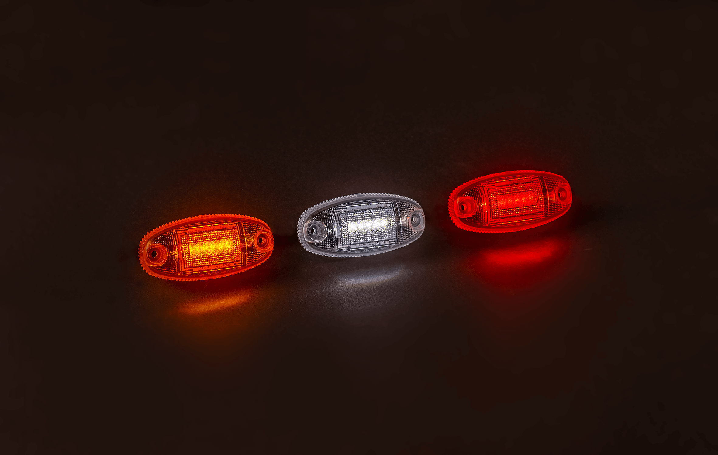 Фонарь габаритный LED 12-36В красный, версия “DARK” и проводом 0,15м (74x36x19)